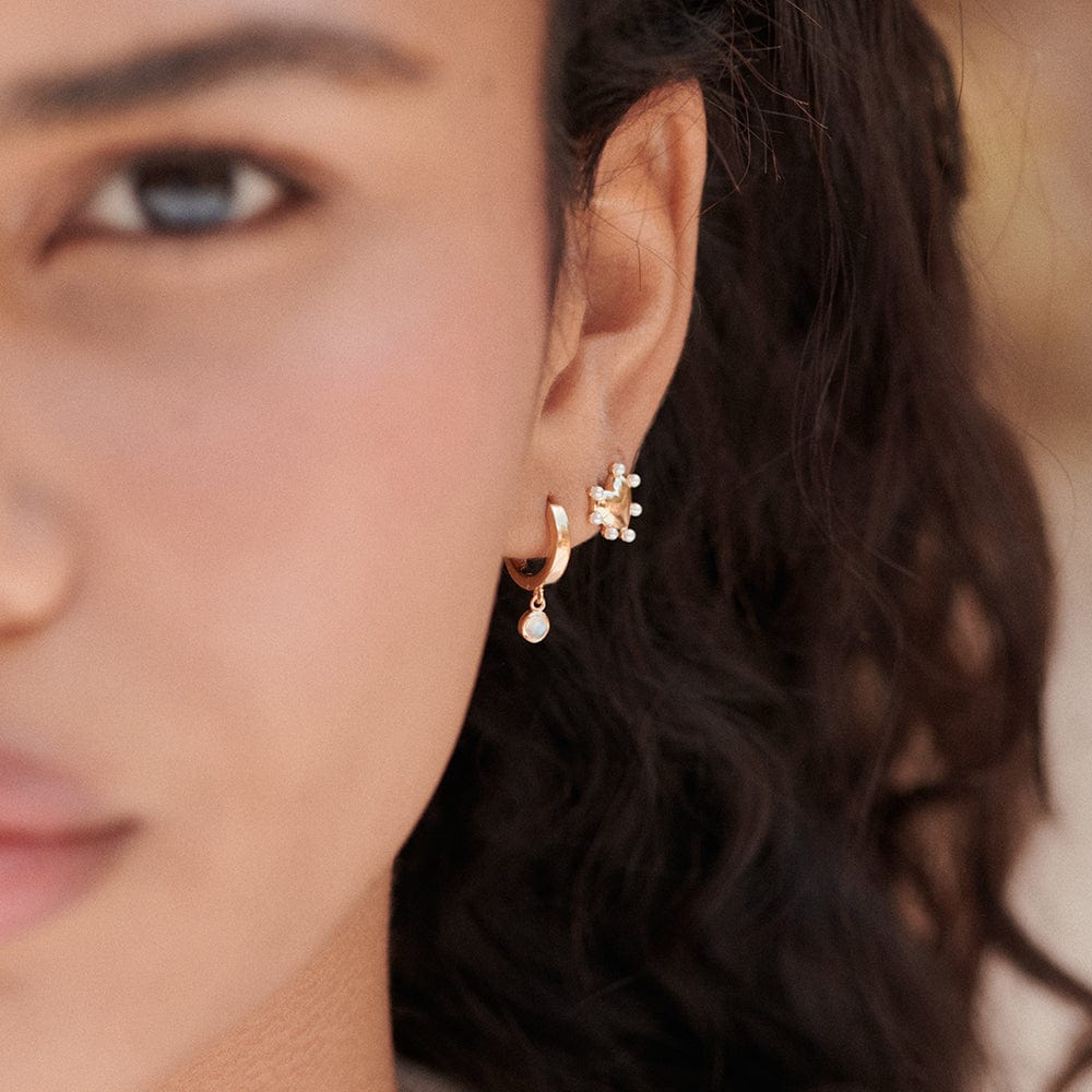 rainbow-moonstone-healing-huggie-hoop-earrings-18ct-gold-plated-daisy-london