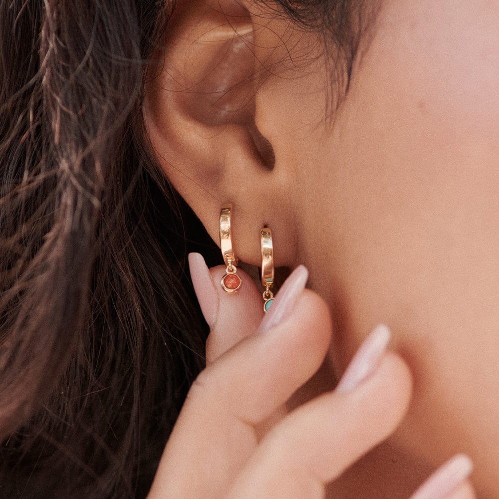 red-coral-healing-huggie-hoop-earrings-18ct-gold-plated-daisy-london