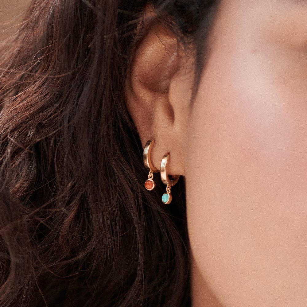 red-coral-healing-huggie-hoop-earrings-18ct-gold-plated-daisy-london
