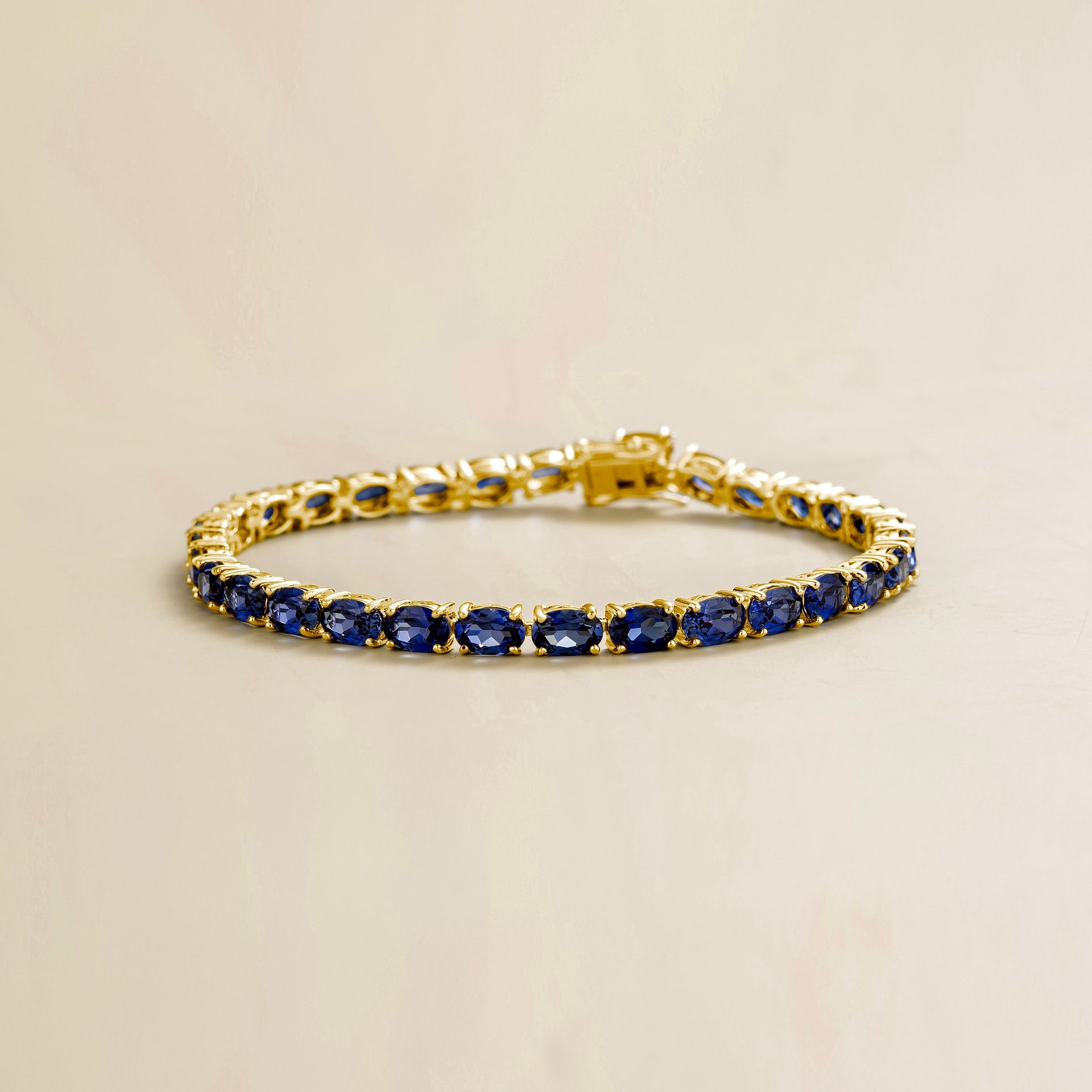 Salto Gold Tennis Bracelet Set With Blue Sapphire