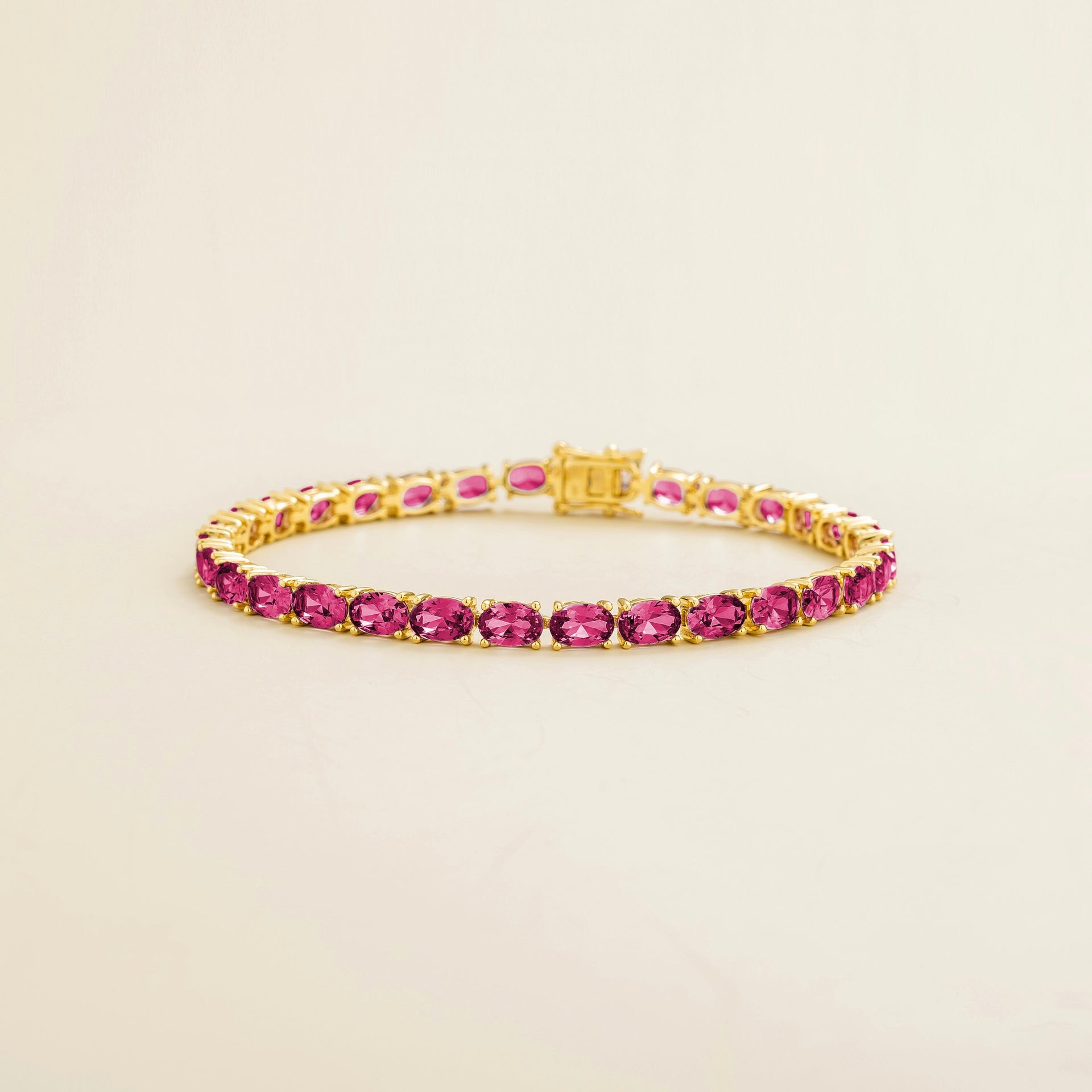 Salto Gold Tennis Bracelet Set With Vivid Pink Sapphire