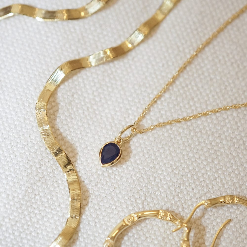sapphire-september-birthstone-charm-necklace-18ct-gold-plated-daisy-london