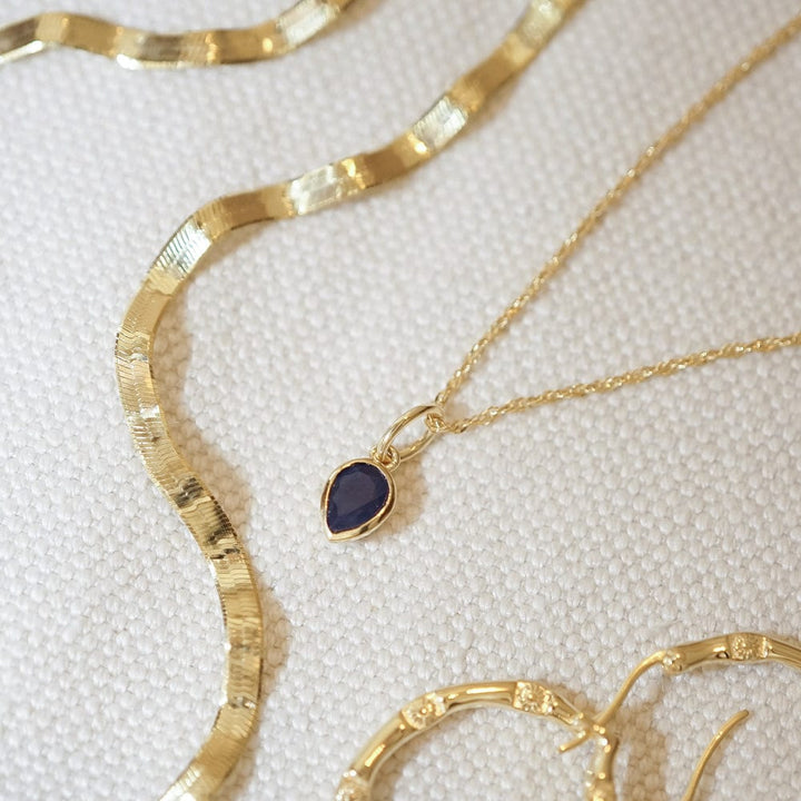 sapphire-september-birthstone-charm-necklace-18ct-gold-plated-daisy-london