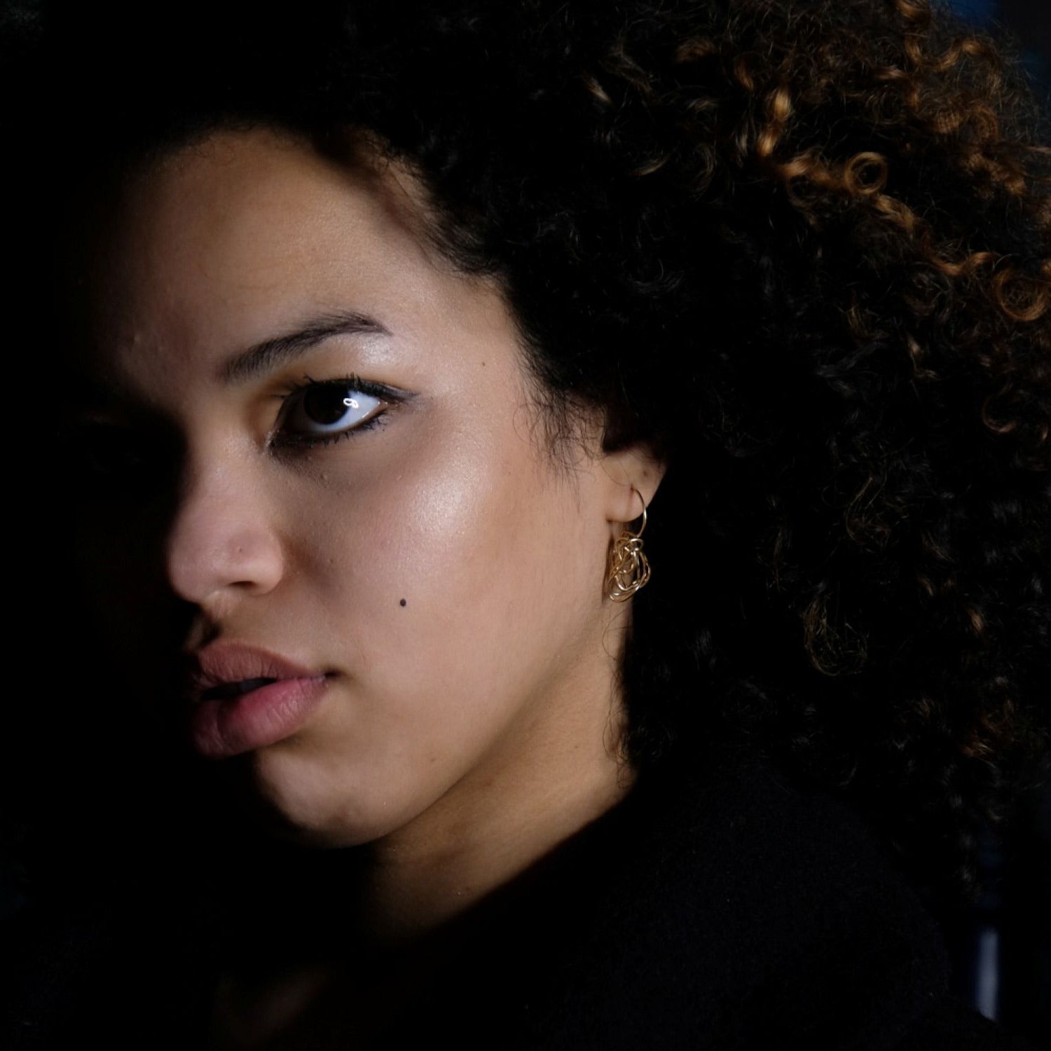 Short And Knotty Gold Dangle Earrings