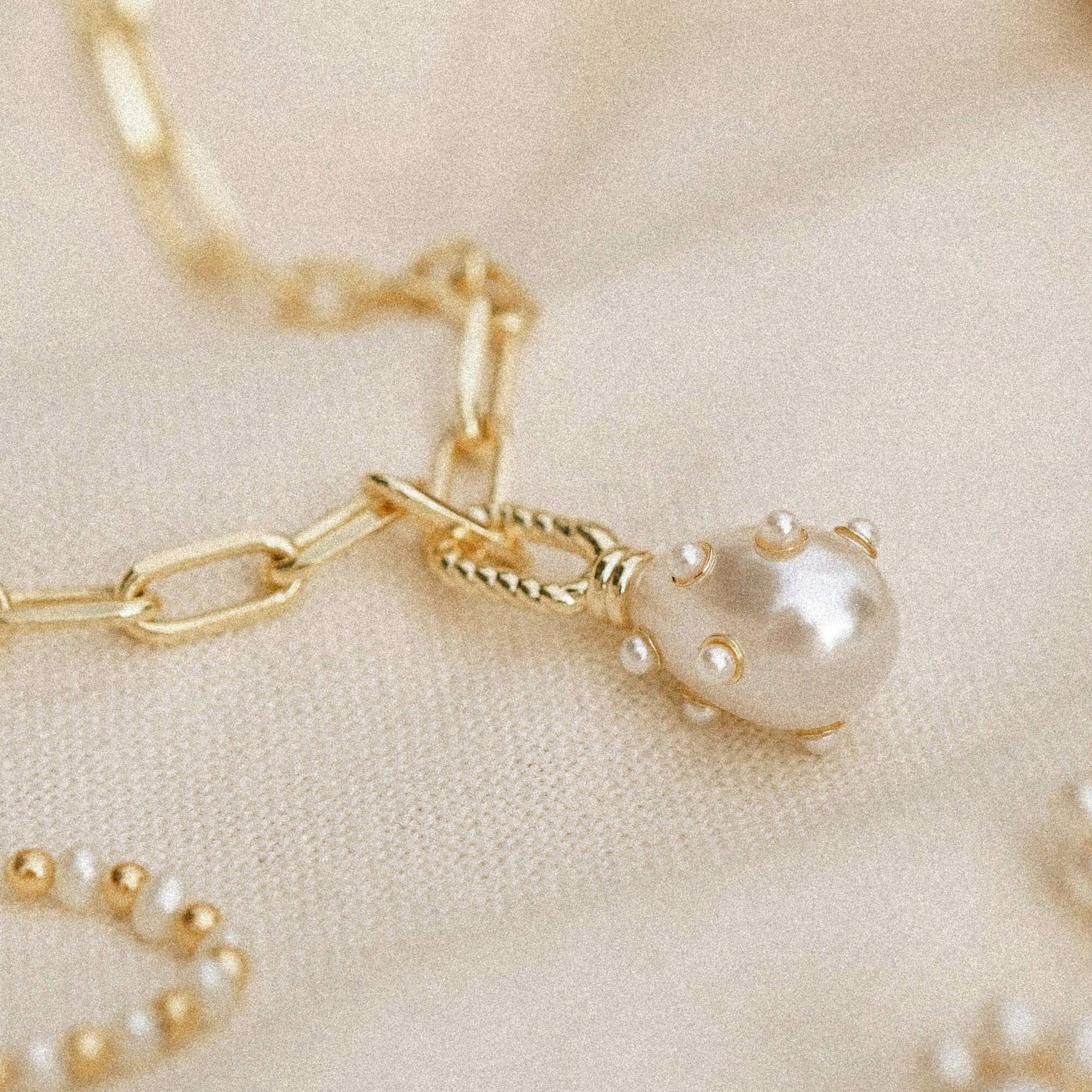 shrimps-pearl-charm-bracelet-18ct-gold-plated-daisy-london