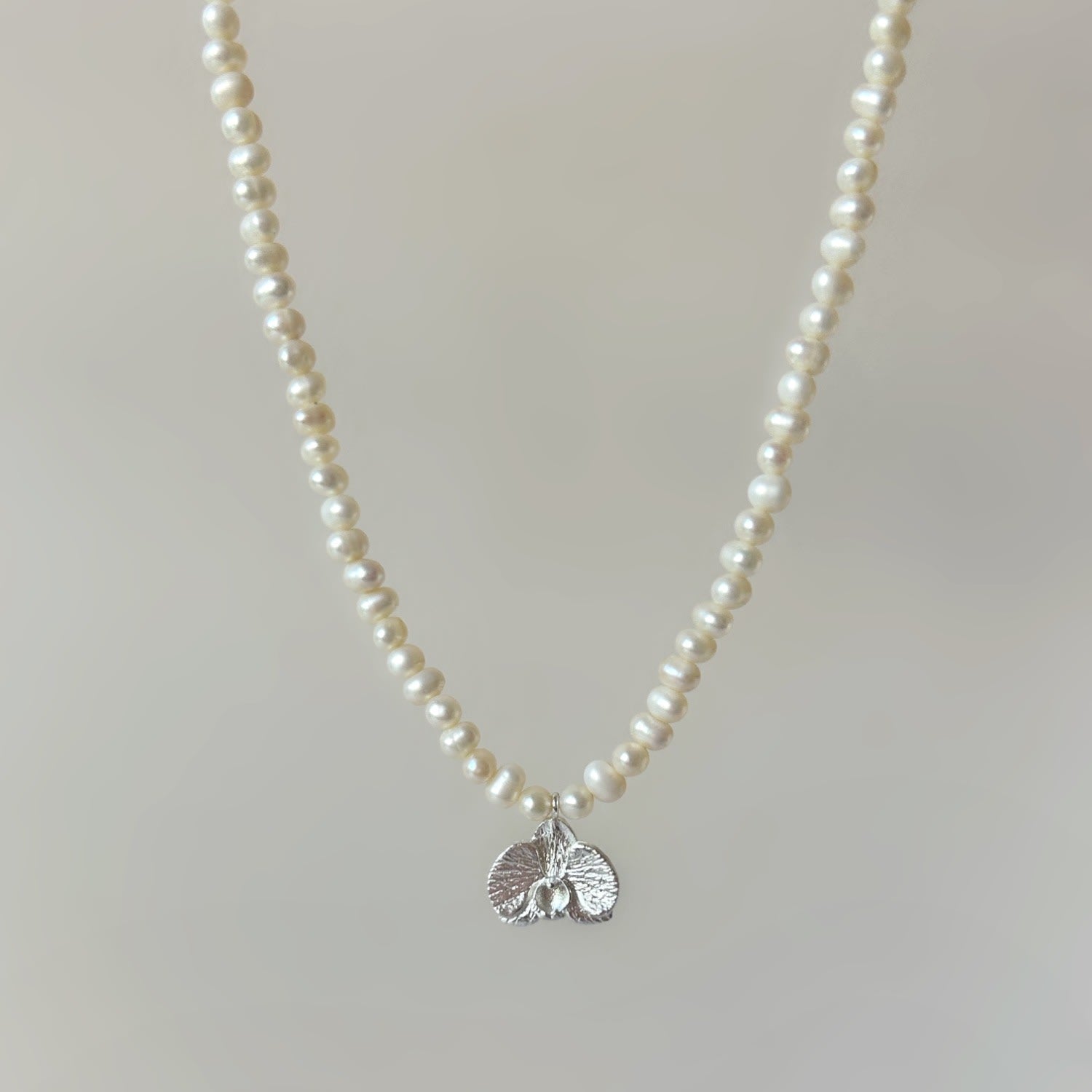 Silver Orchid White Pearl Necklace