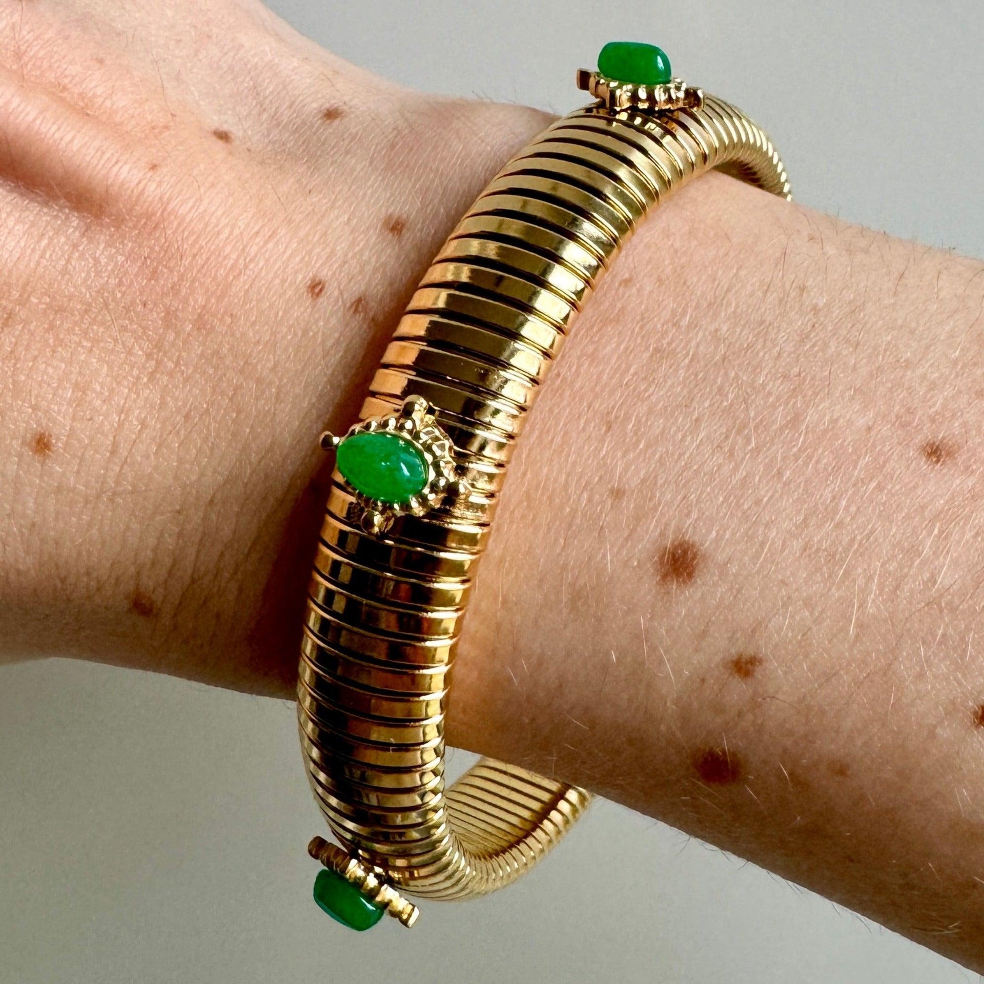 Small Green Stone Gold Omega Bracelet