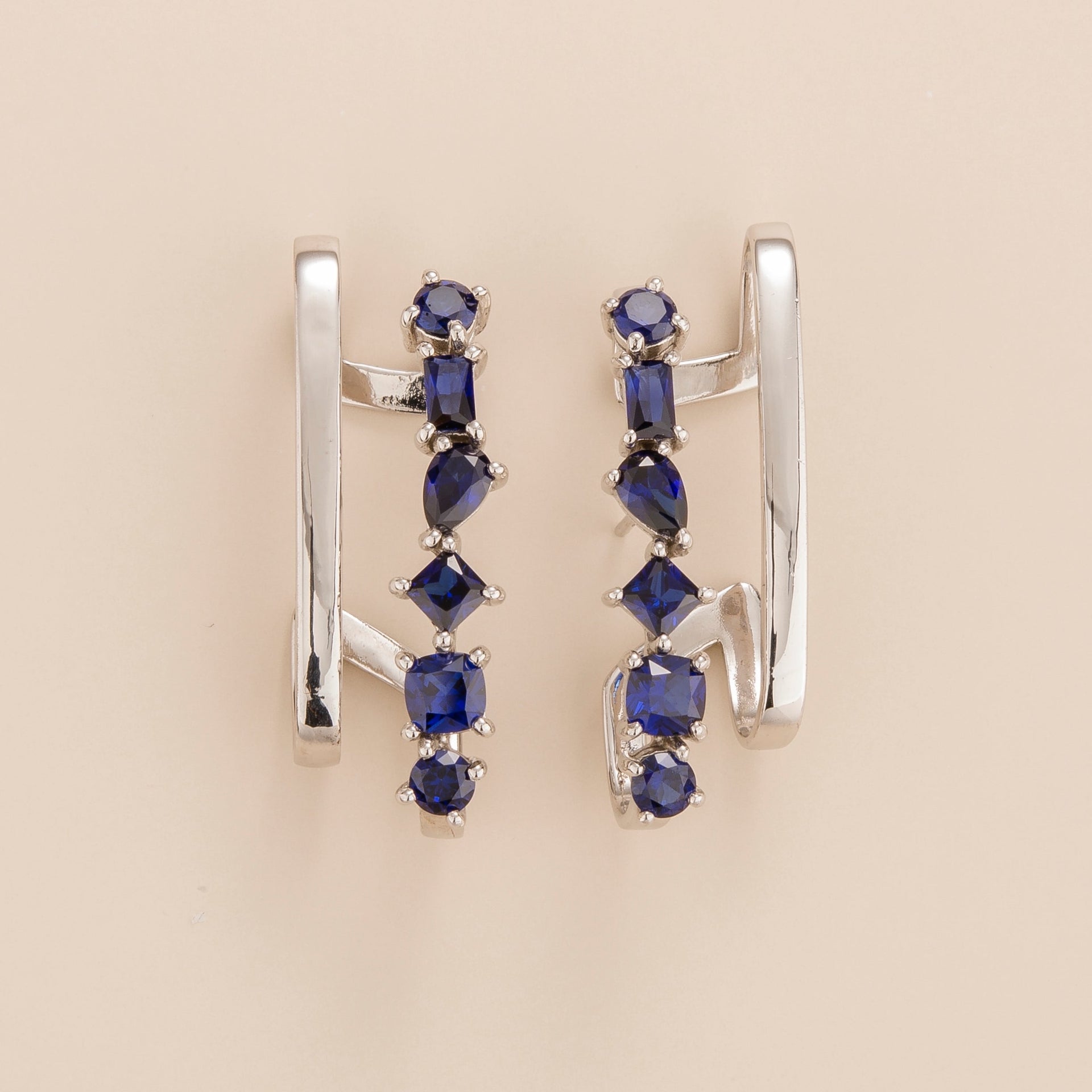 Serene White Gold Earrings In Blue Sapphire