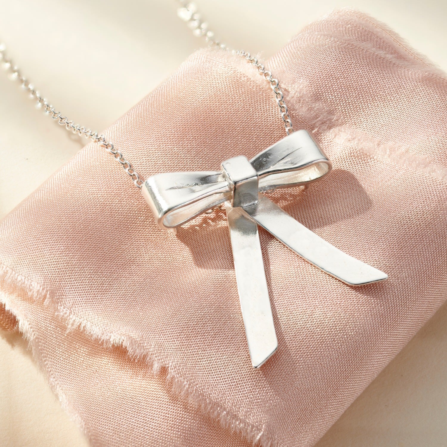 Sterling Silver Bow Charm Necklace