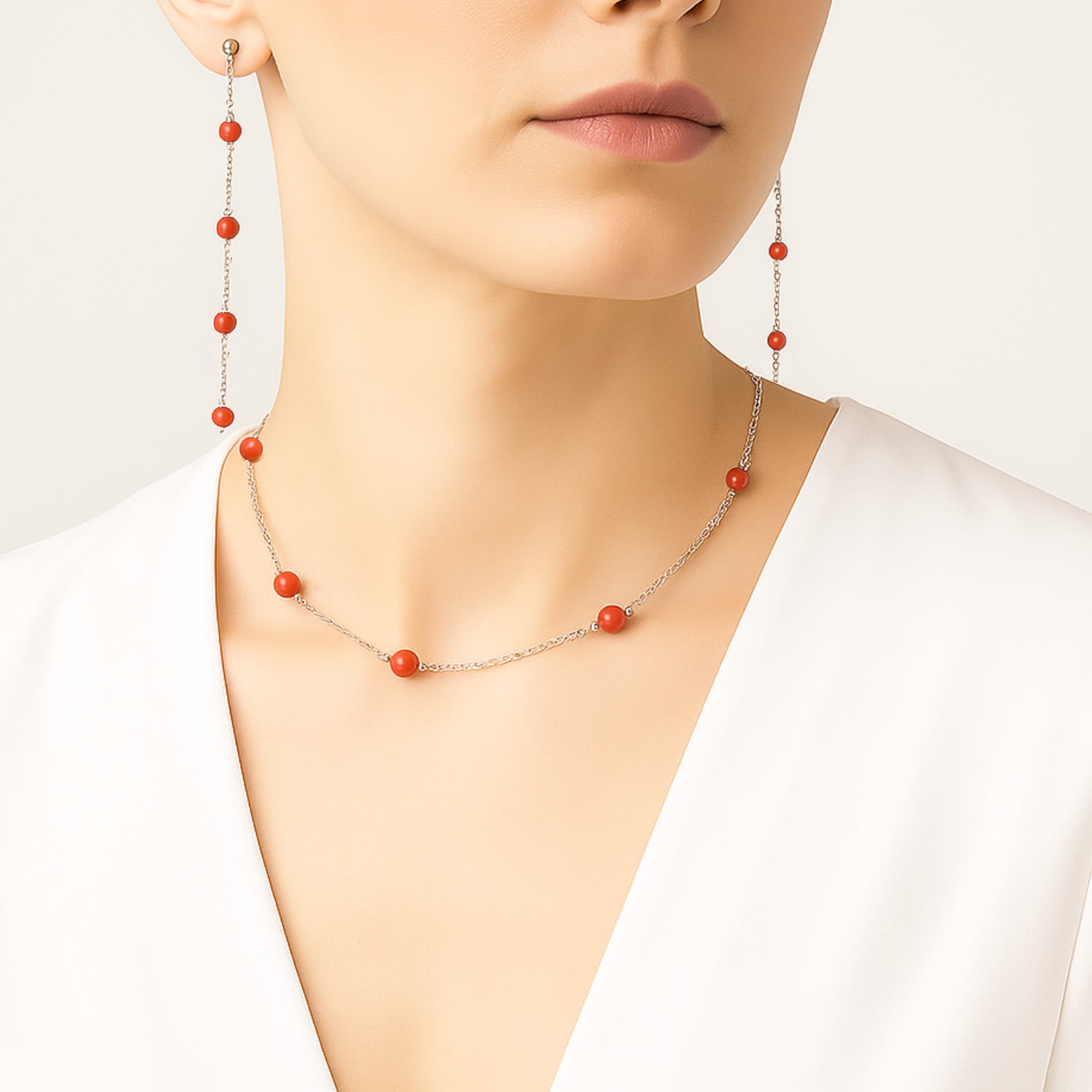 Dangling Earrings In Sterling Silver With Natural Coral Beads
