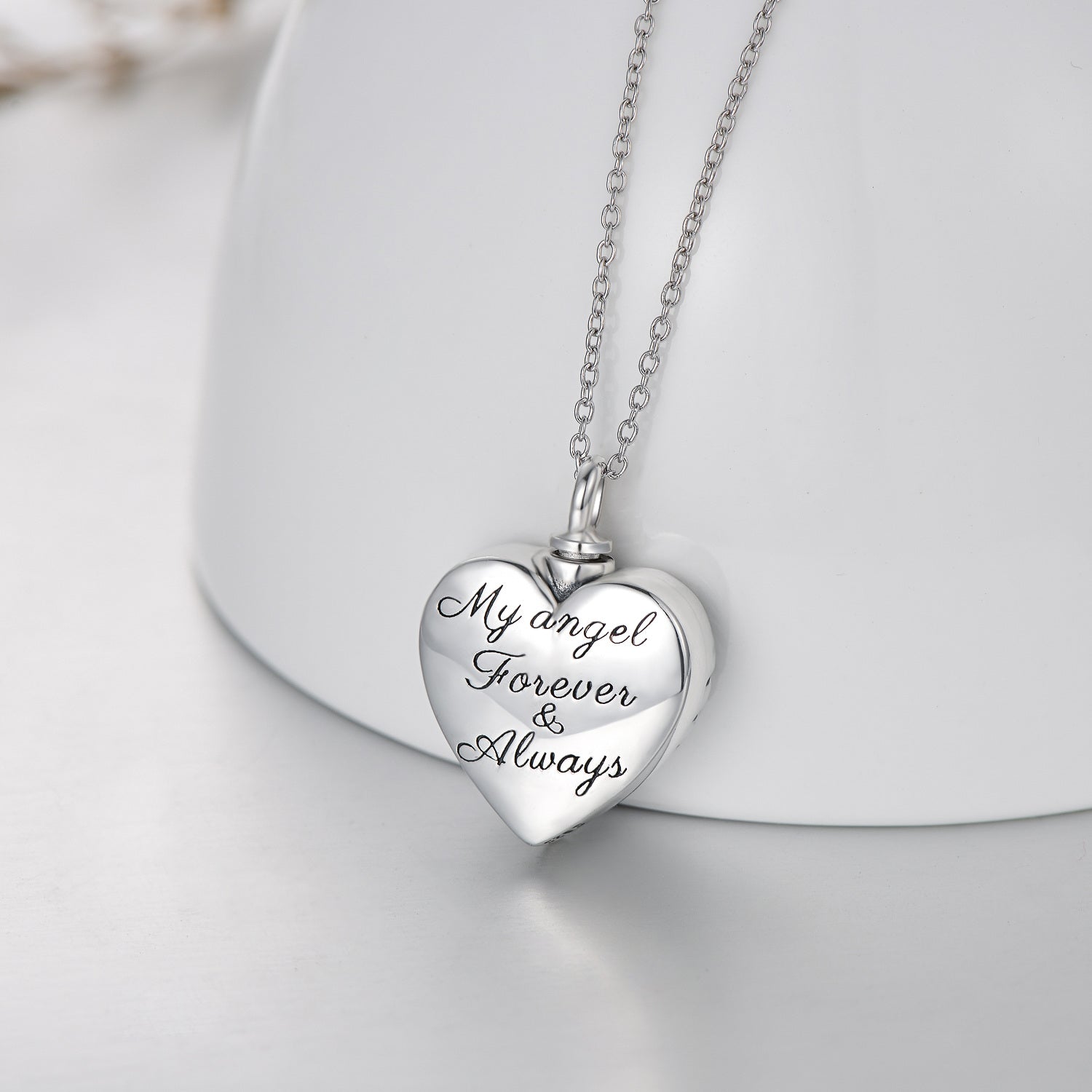 Sterling Silver Circular Shaped Cubic Zirconia Angel Wing & Heart Urn Necklace for Ashes with Engraved Word