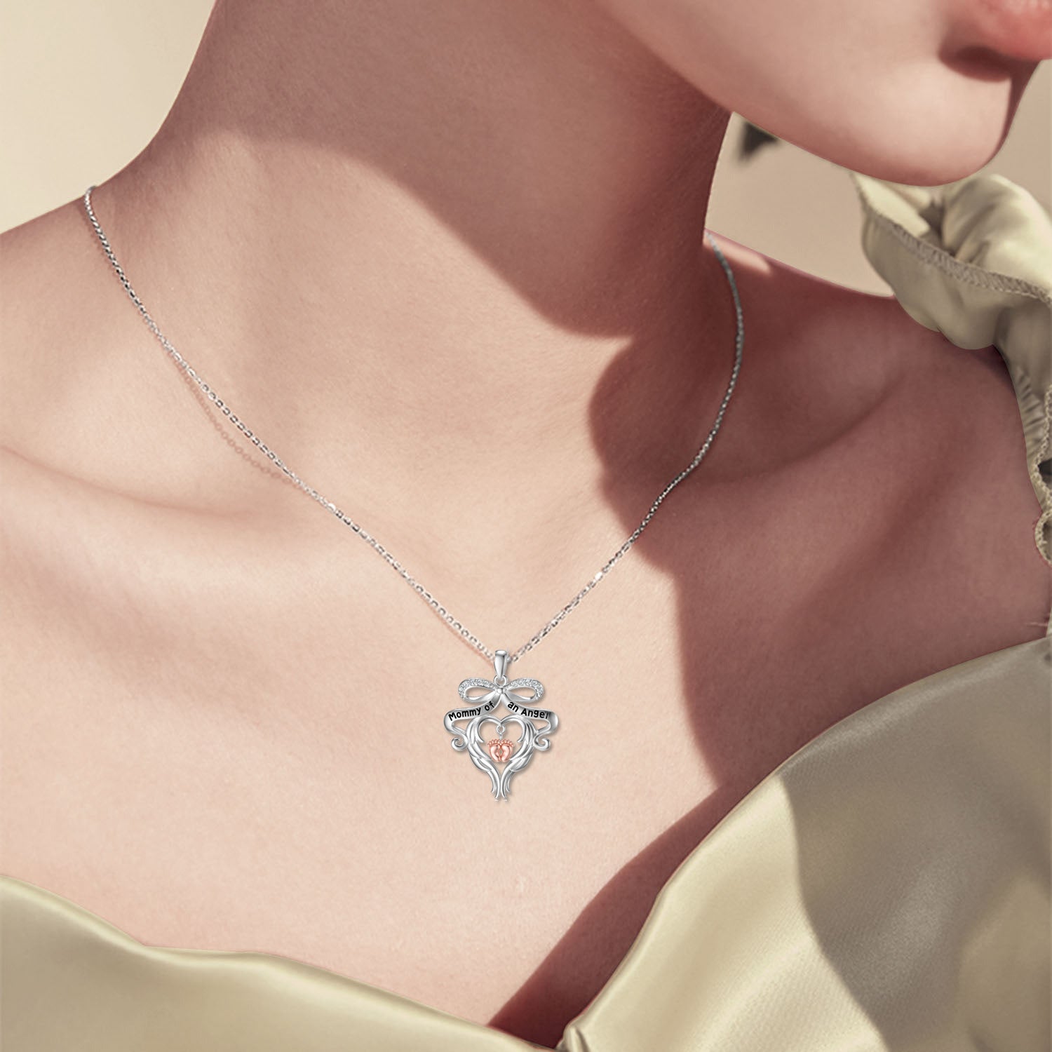 Sterling Silver Circular Cubic Zirconia Bow With Footprints With Heart Pendant Necklace With Engraved Word For Women