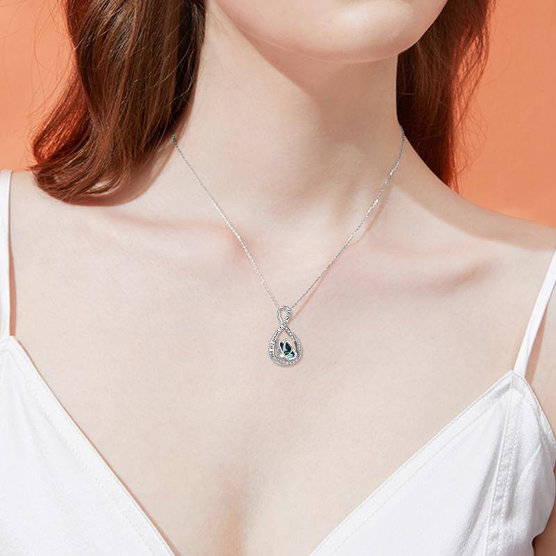 Sterling Silver Circular Shaped Cubic Zirconia Butterfly & Infinity Symbol Urn Necklace for Ashes with Engraved Word
