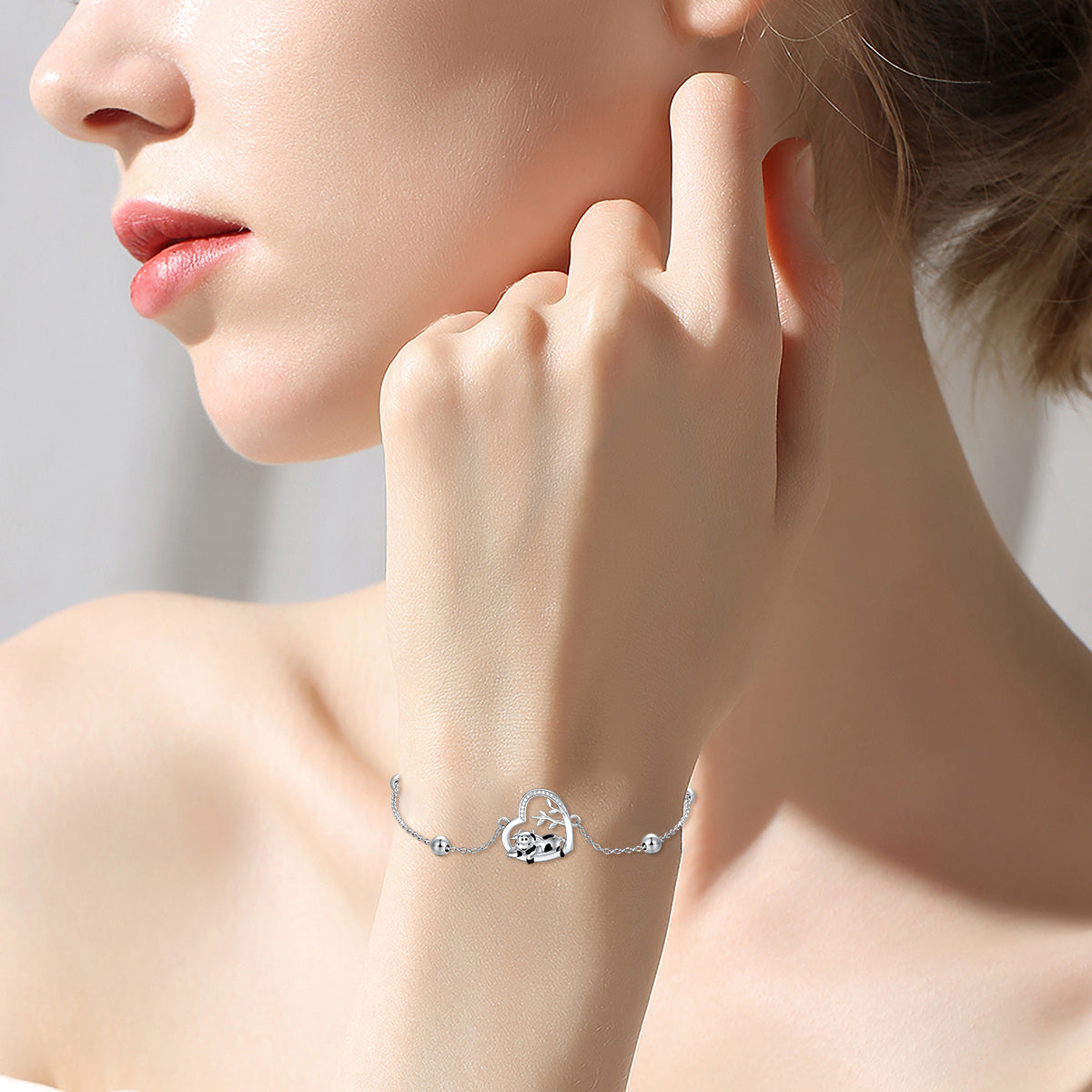 Sterling Silver Circular Shaped Cubic Zirconia Cow & Heart Charm Bracelet