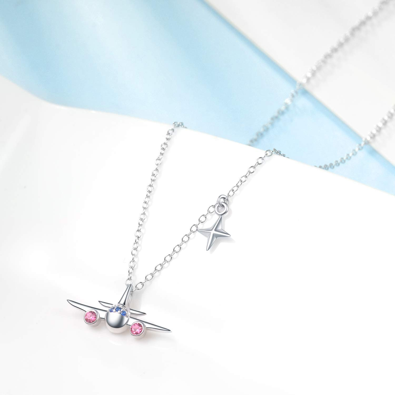 Sterling Silver Circular Shaped Crystal Airplane & Star Pendant Necklace
