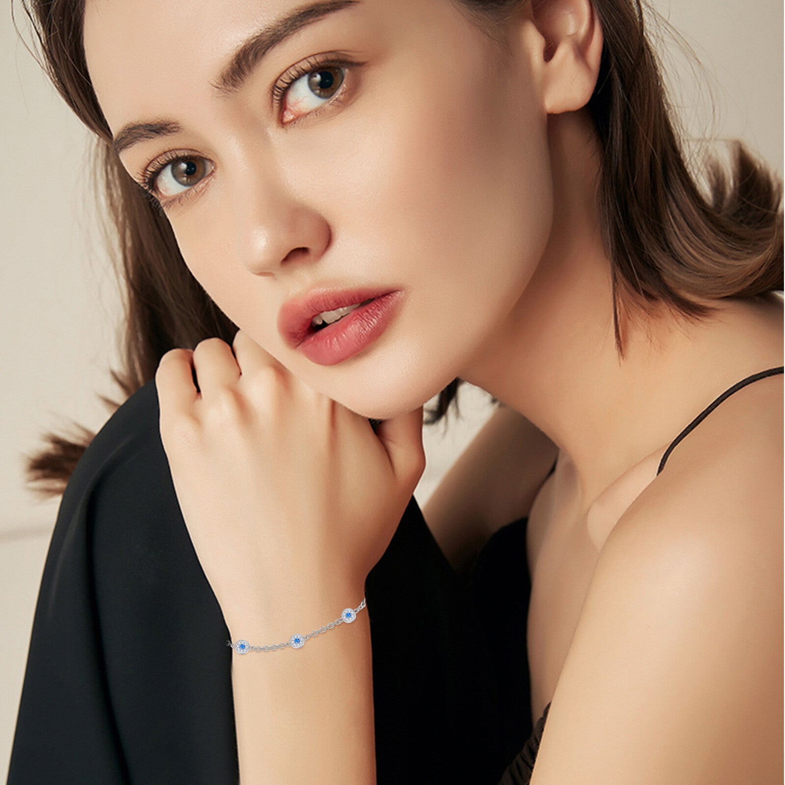 Sterling Silver Circular Shaped Cubic Zirconia Evil Eye Bead Station Chain Bracelet