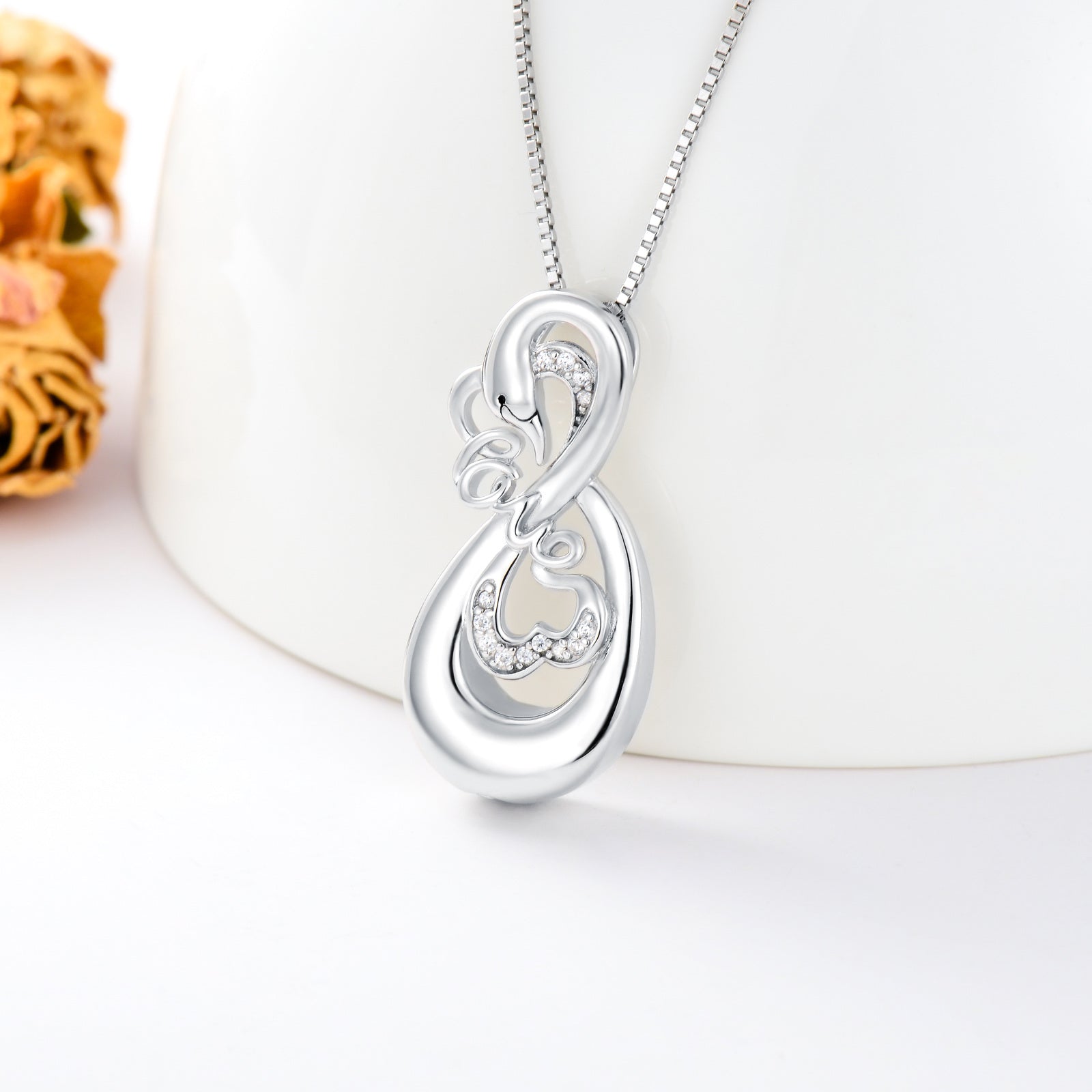Sterling Silver Circular Shaped Cubic Zirconia Swan Urn Necklace for Ashes with Engraved Word