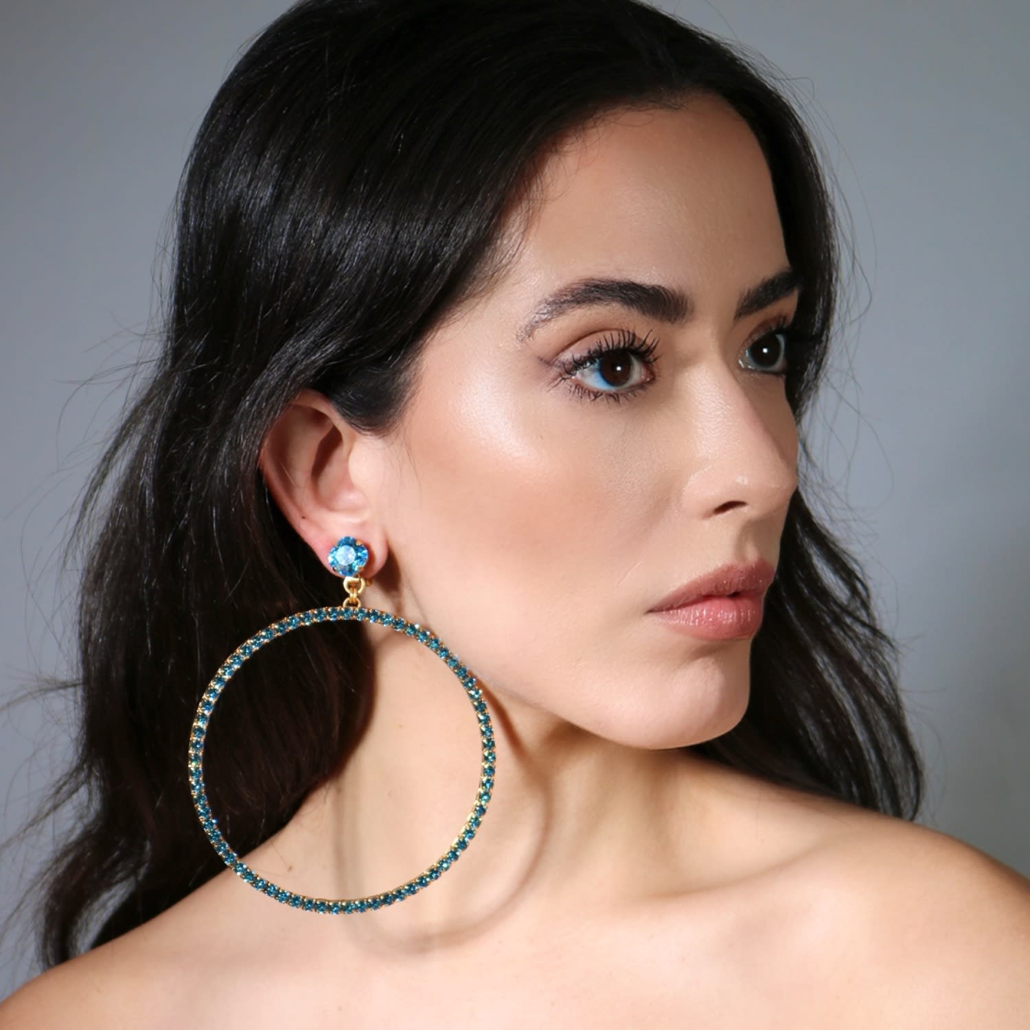The Jumbo Blue Hoop Earrings In Gold - Clip