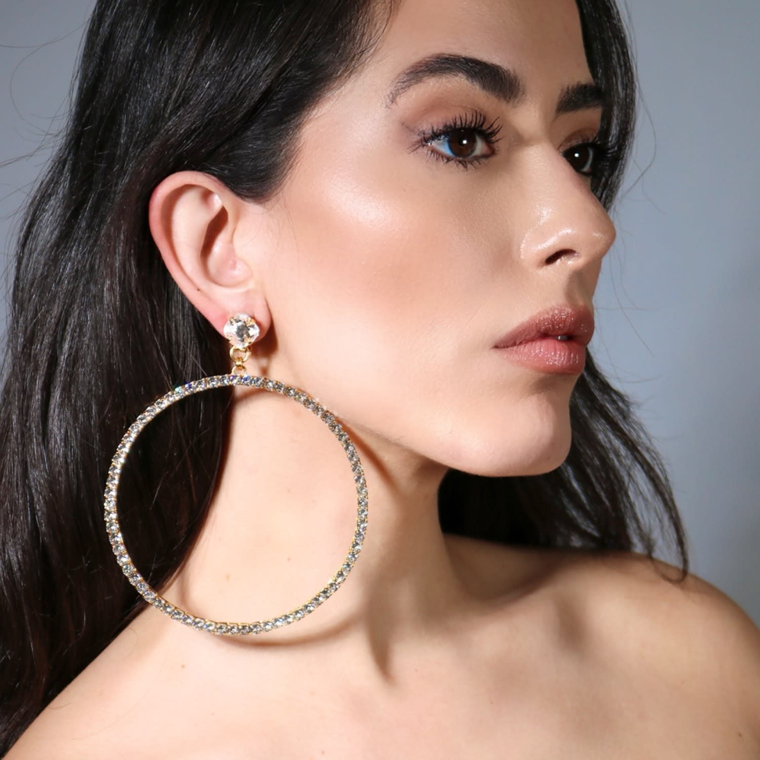 The Jumbo Clear Hoop Earrings In Gold - Clip