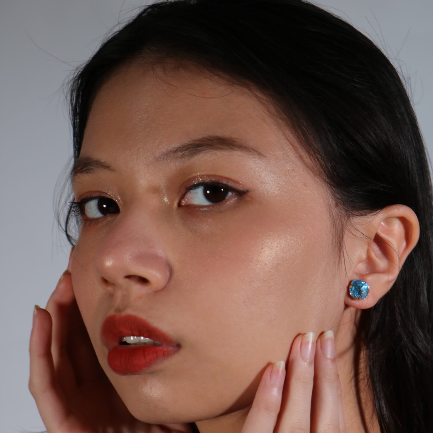 The Large Blue Stud In Gold