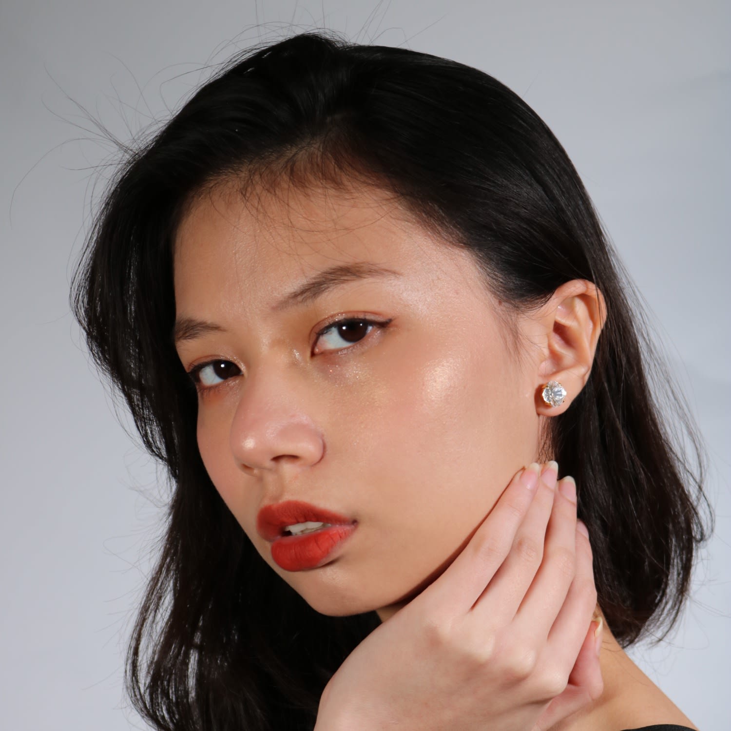 The Large Clear Stud In Gold