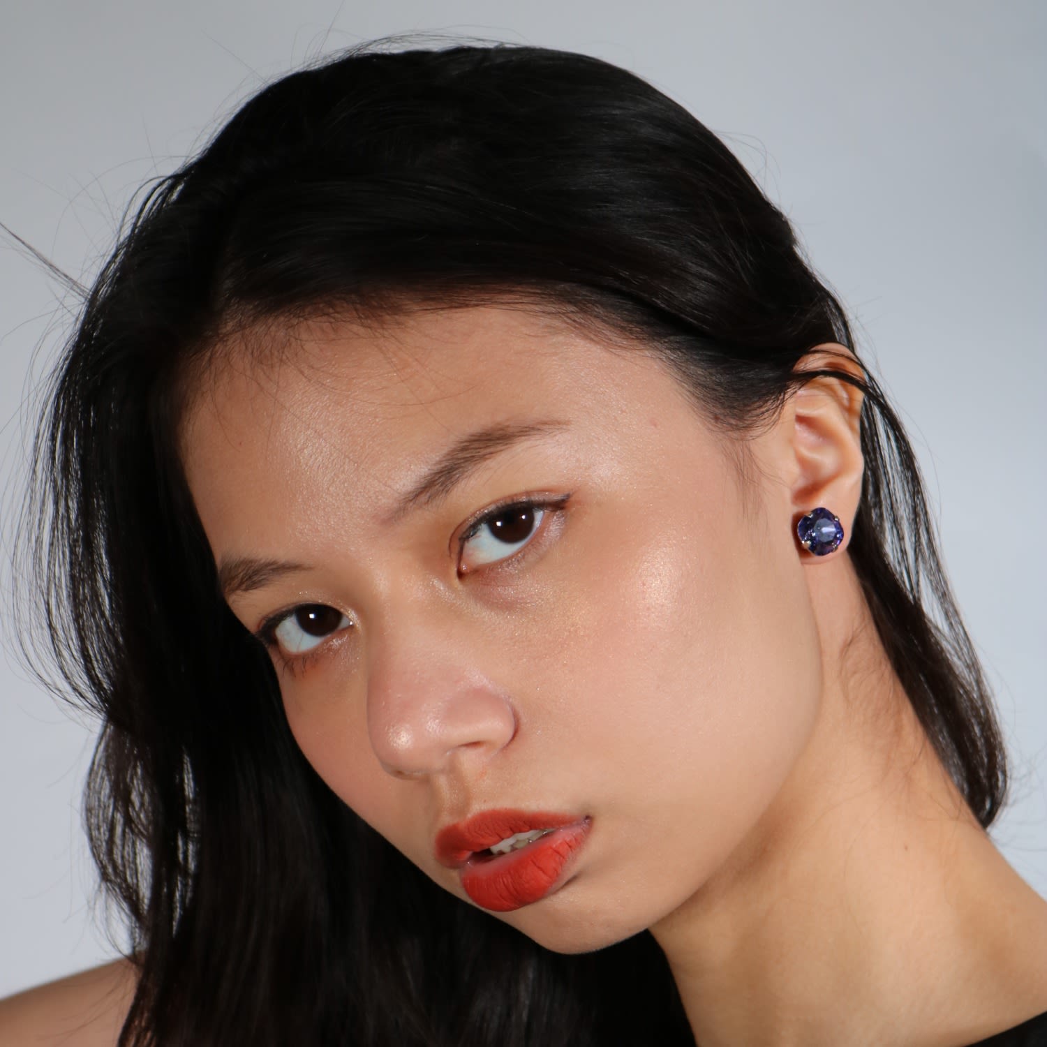 The Large Purple Stud In Platinum