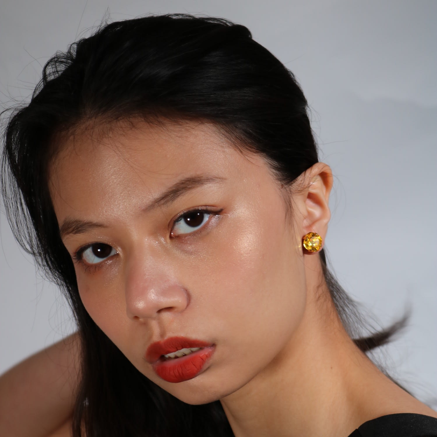 The Large Yellow Stud In Gold