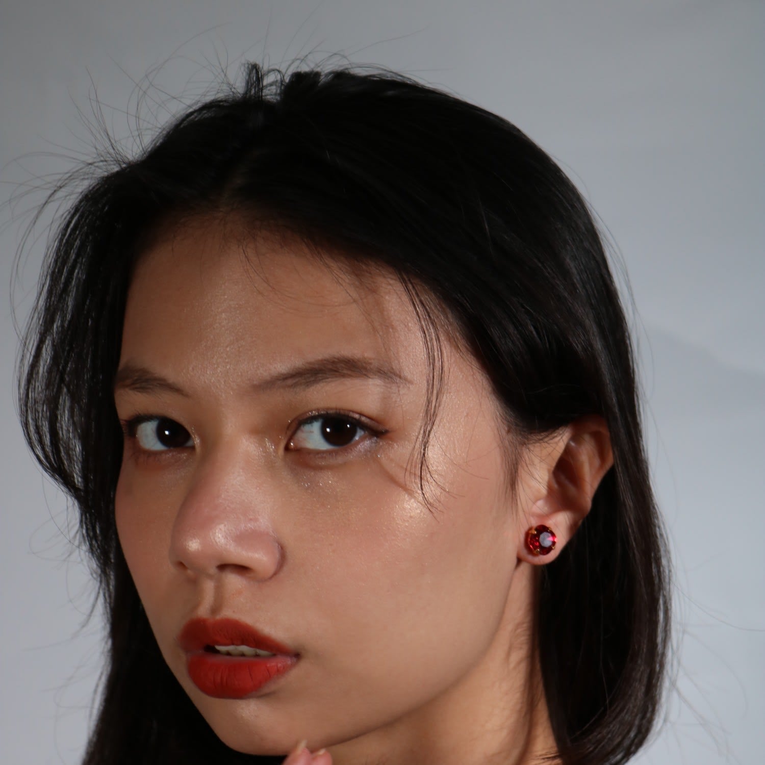 The Little Red Stud In Gold