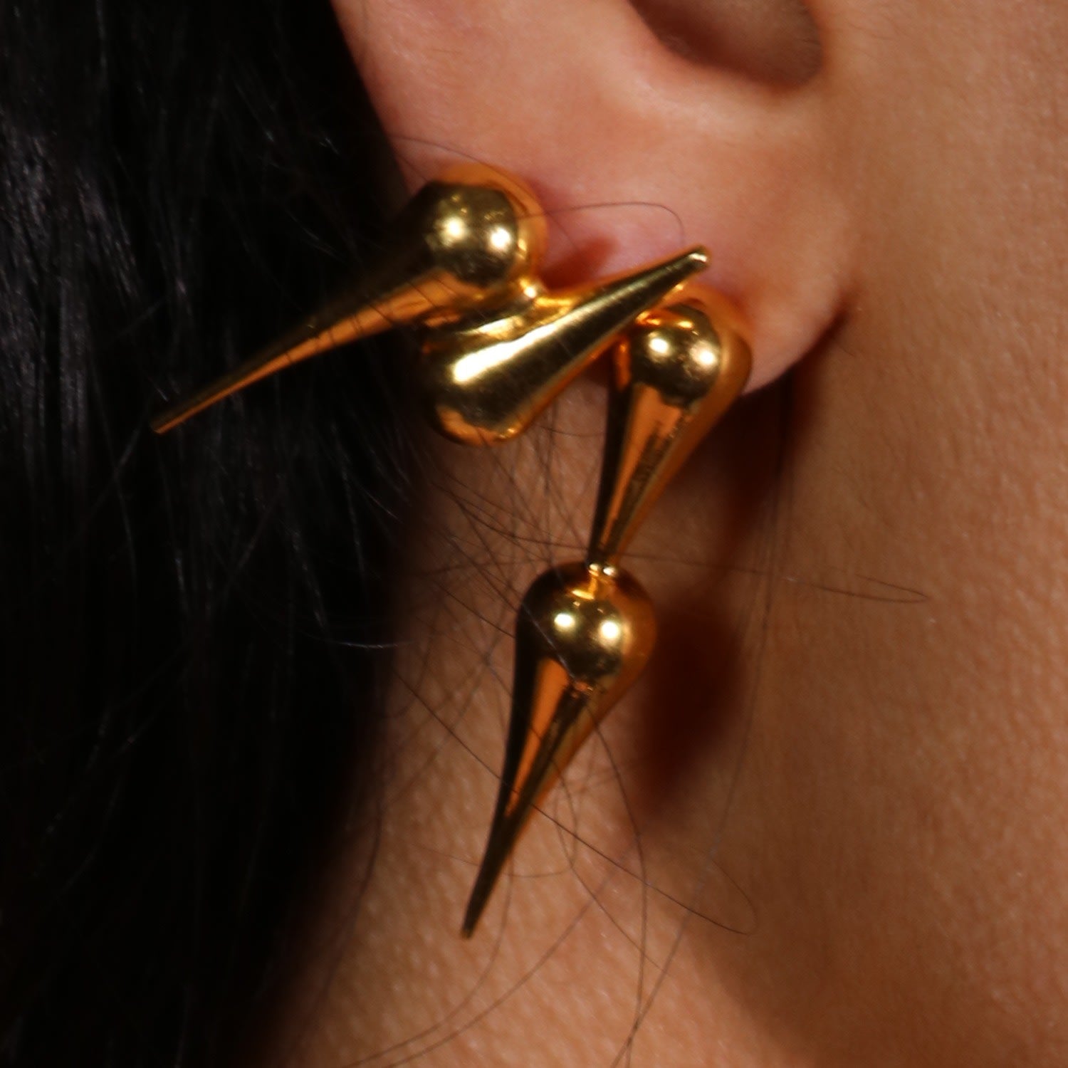 The Opposite Studs In Gold