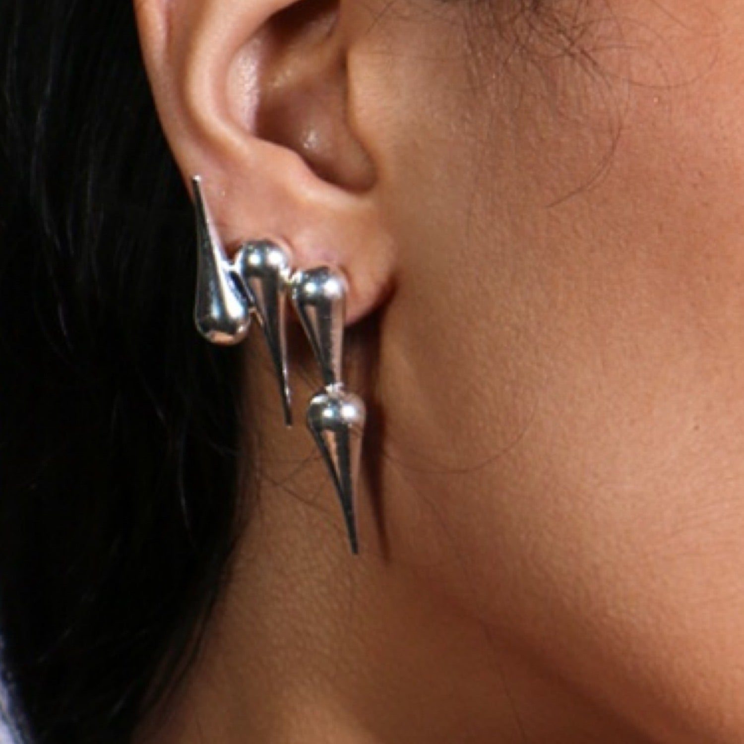 The Opposite Studs In Silver