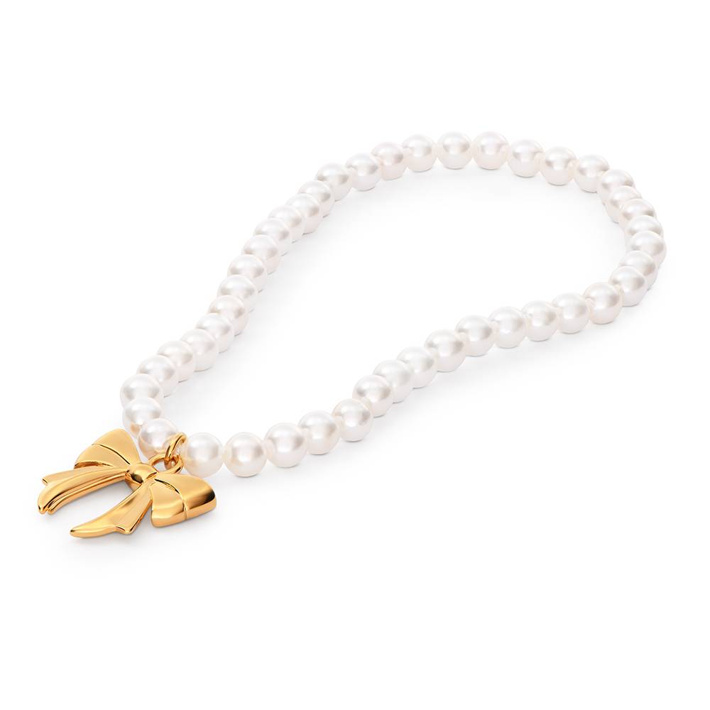 The Petite Pearl Bow Bracelet in Gold Plating