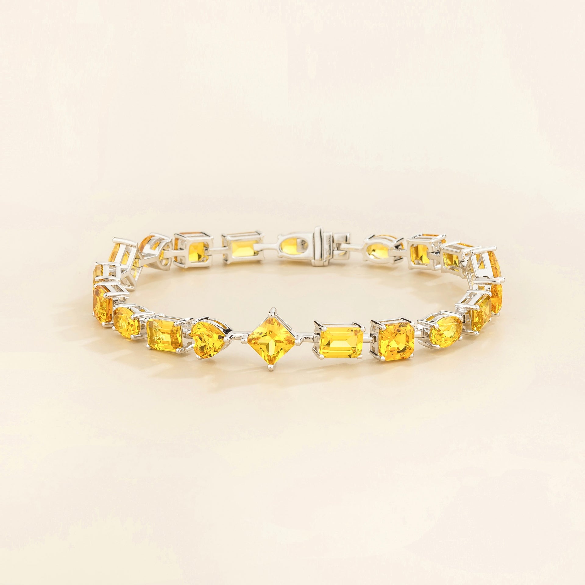Una White Gold Tennis Bracelet Set With Yellow Sapphire