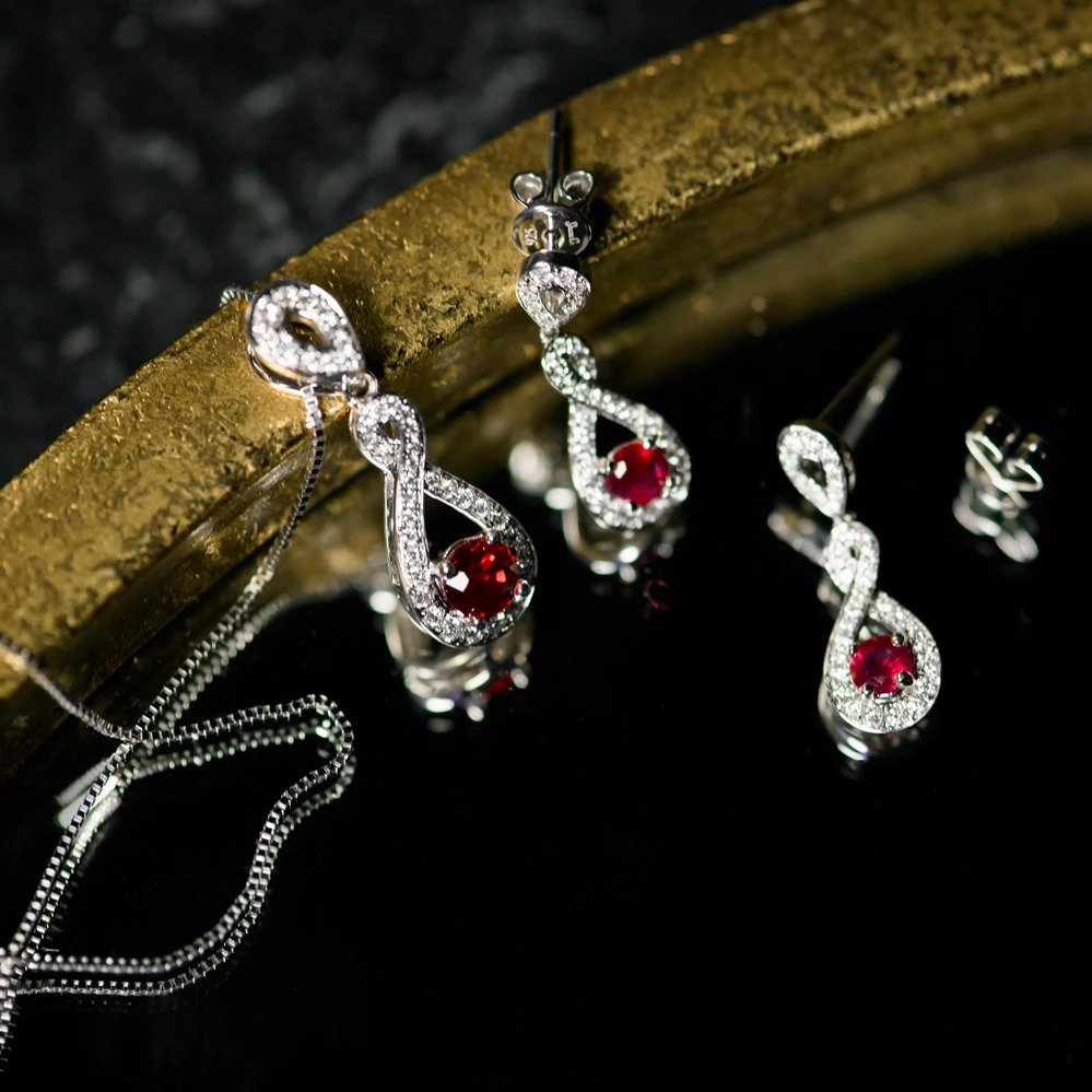 ruby-and-diamond-swirl-earrings