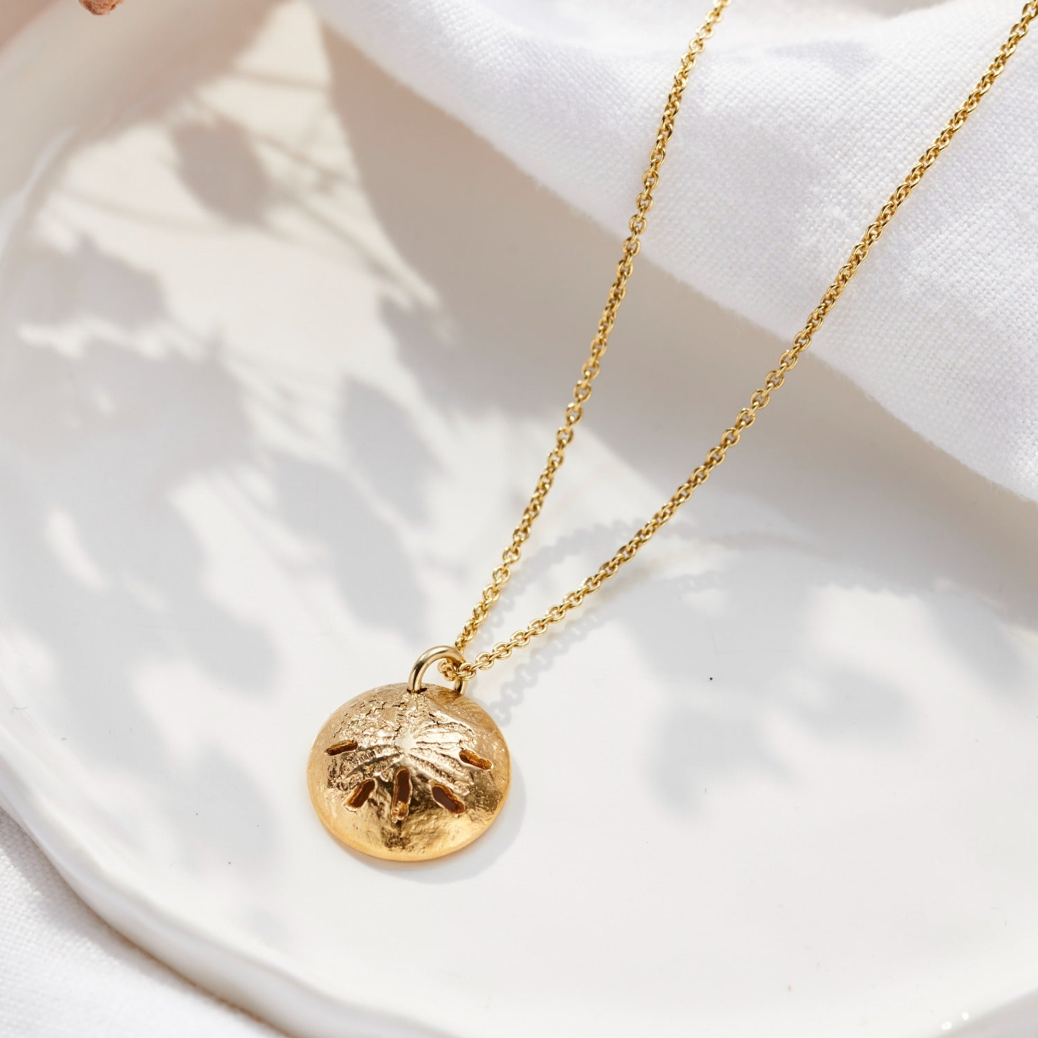 Gold Plated Curved Sand Dollar Necklace