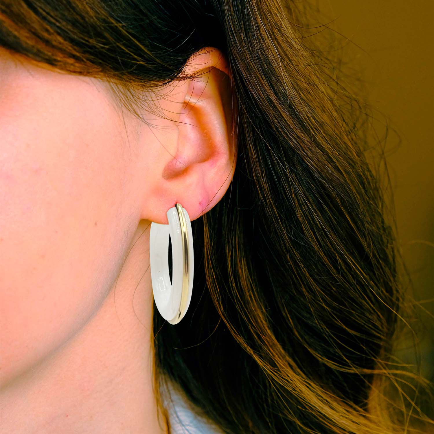 White Resin Hoop Earrings With Gold Stripe Down The Middle