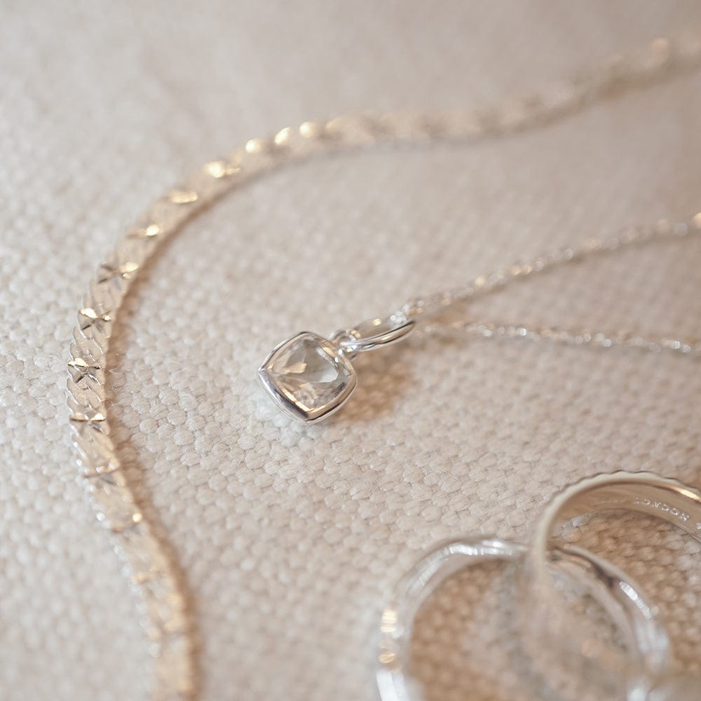 white-topaz-april-birthstone-charm-necklace-sterling-silver-daisy-london