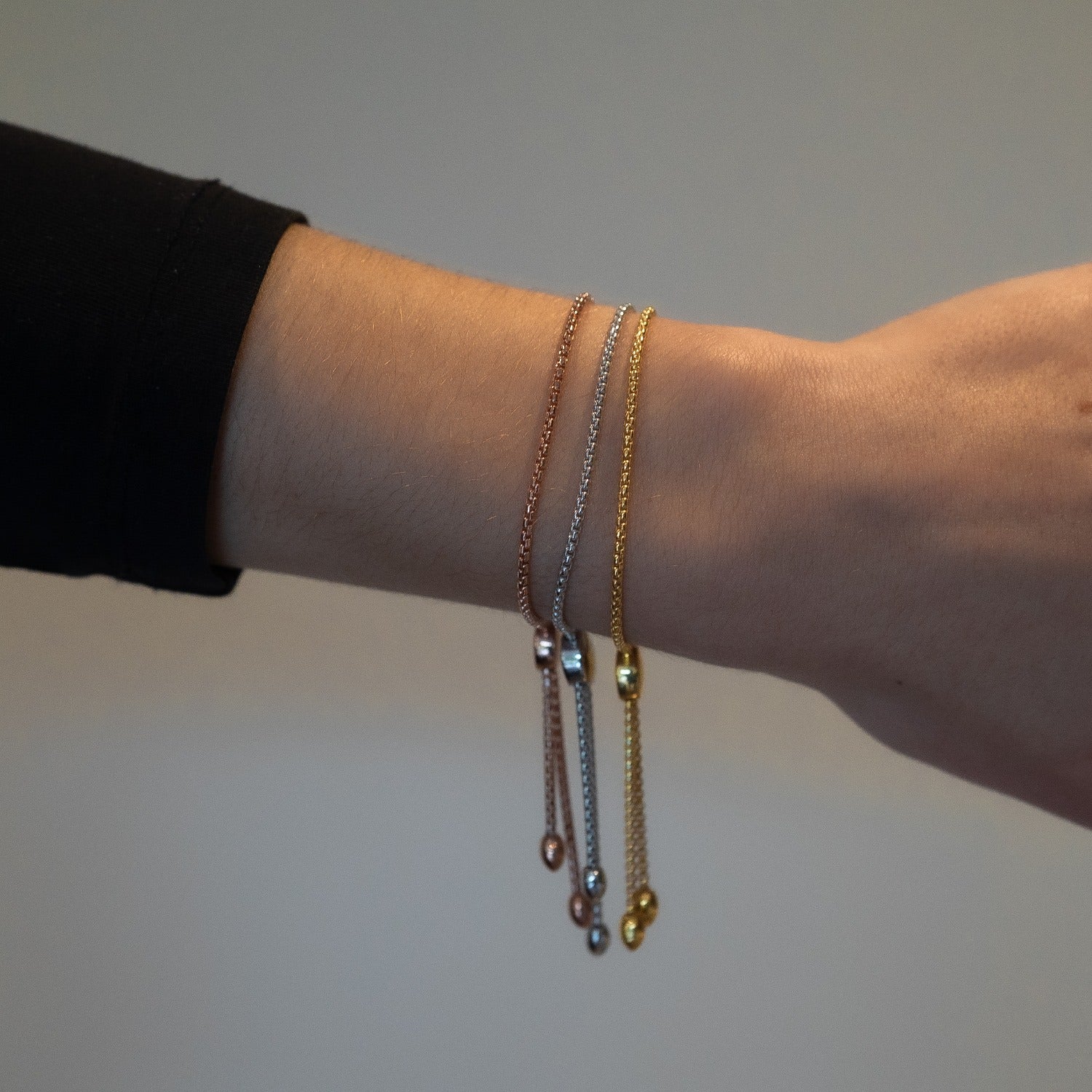 Three Multi Colour Dangly Adjustable Bracelets