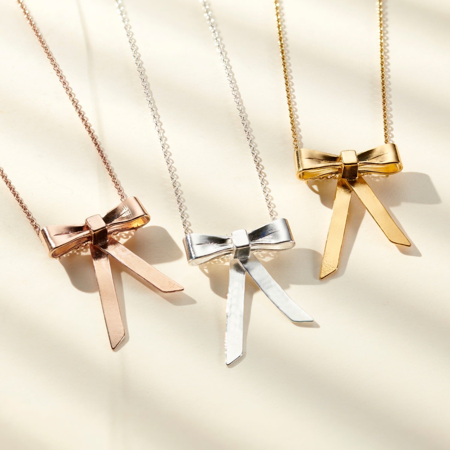 Yellow Gold Plated Bow Charm Necklace